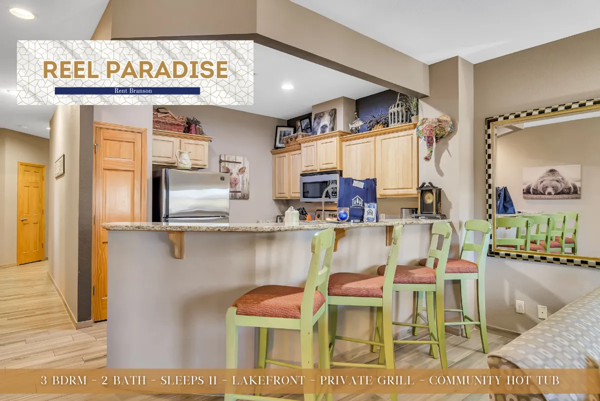 An inviting kitchen with a central island, bar stools, stylish cabinetry, and decorative artwork. The stage is set for shared meals, family interactions, and relaxed gatherings.